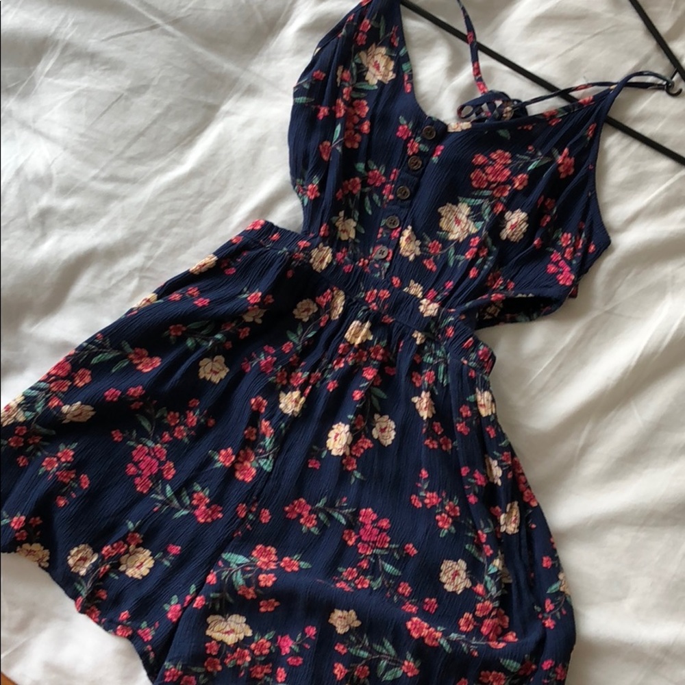 Floral romper with side cutouts